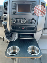 Load image into Gallery viewer, Mercedes-Benz Sprinter NCV3 06-18 Black Hex Cup Holder Snack Tray with XL Stainless Cup Holders. Converts factory sliding cup holders into a small table. Size: 12&quot;x10.25&quot;. High pressure Black hex textured laminate top on 1/2&quot; Baltic birch plywood base. Easy installation/removal, no vehicle modification required.
